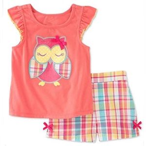 Salmon colored cap ruffle sleeve shirt and shorts set. Size 2T